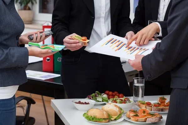 Delicious buffet catering spread with kebabs, roasted vegetables, and fresh salads at Glenny Kebabs.